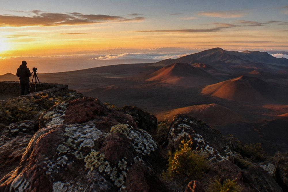 Golden evening light on the cinder cones inside Haleakala Crater from a summit overlook