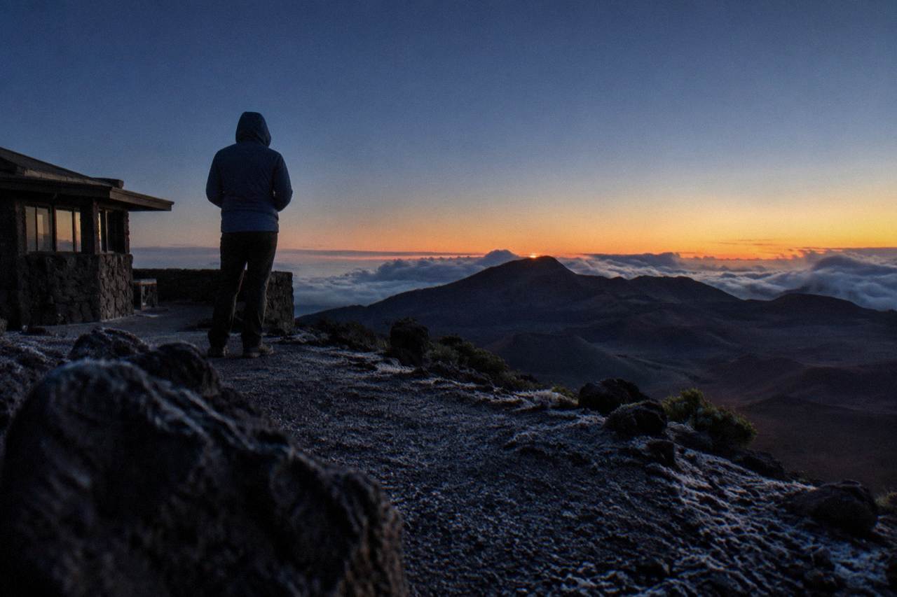 Predawn sky glowing above the Haleakala summit overlooks