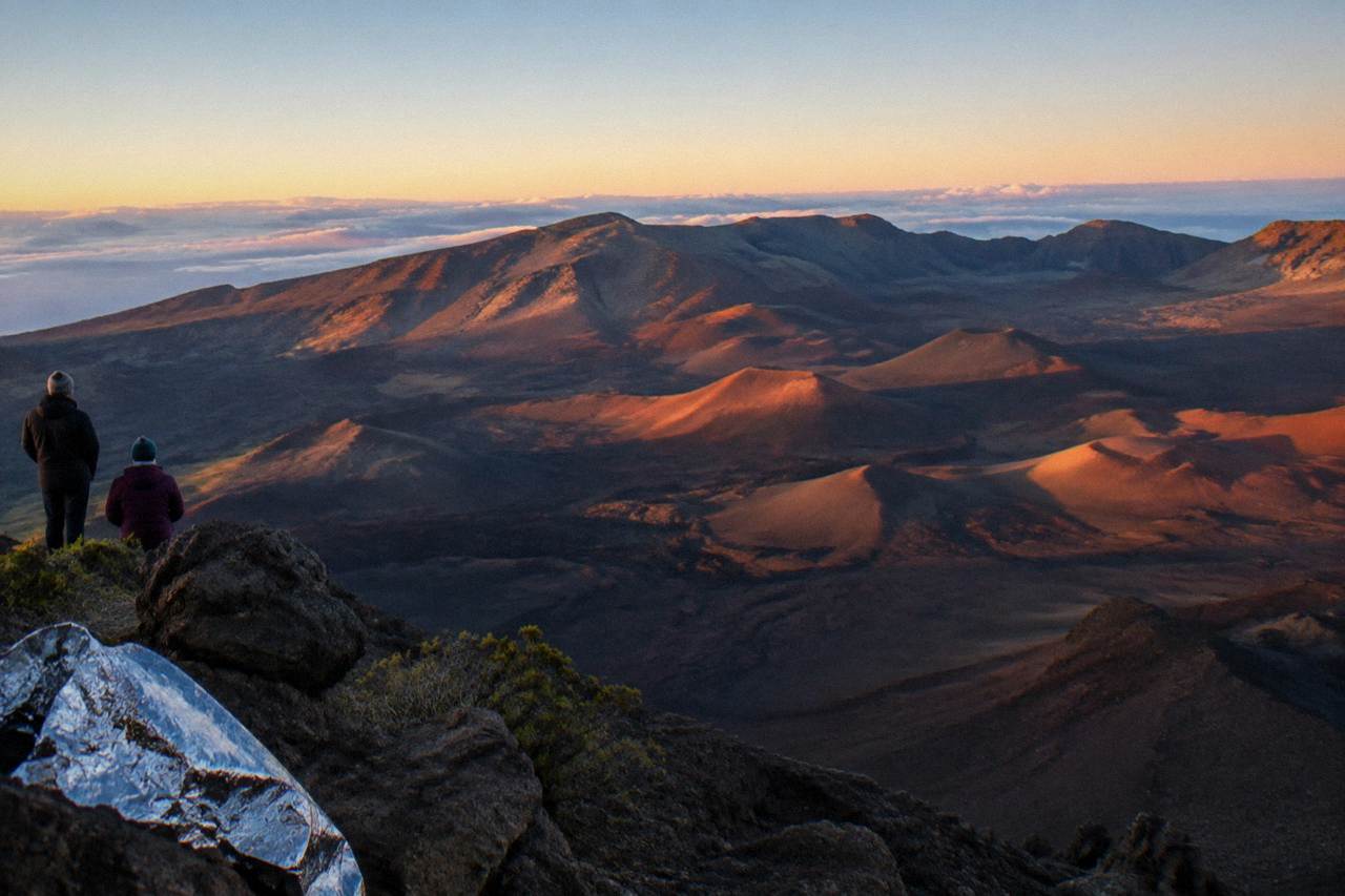 The wide floor and cinder cones of the Haleakala crater under morning light