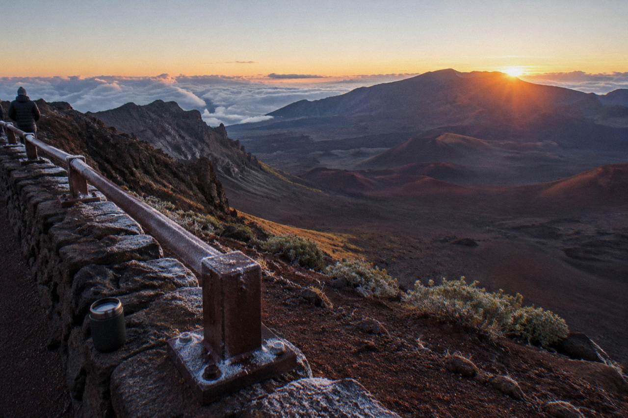 First light spreading over the Haleakala crater floor from a summit overlook