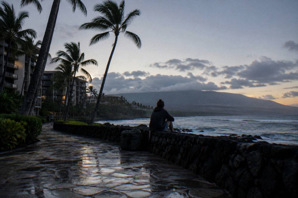 Coastal Maui resort area under early morning light before a summit trip
