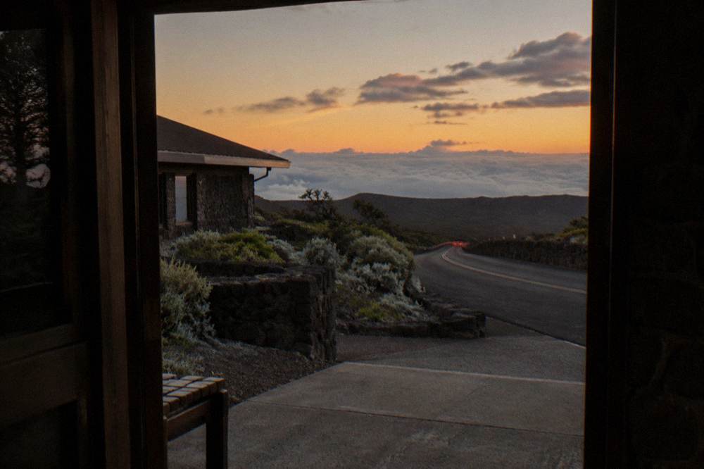 The crater road descending from the summit in evening light